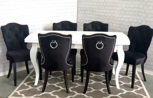 Stół drewniany rozkładany Massimo biały krzesła tapicerowane Roma czarne